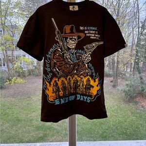 2022 END OF DAYS WARREN LOTAS TEE
Brown Short Sleeve Tee with Western Graphic
